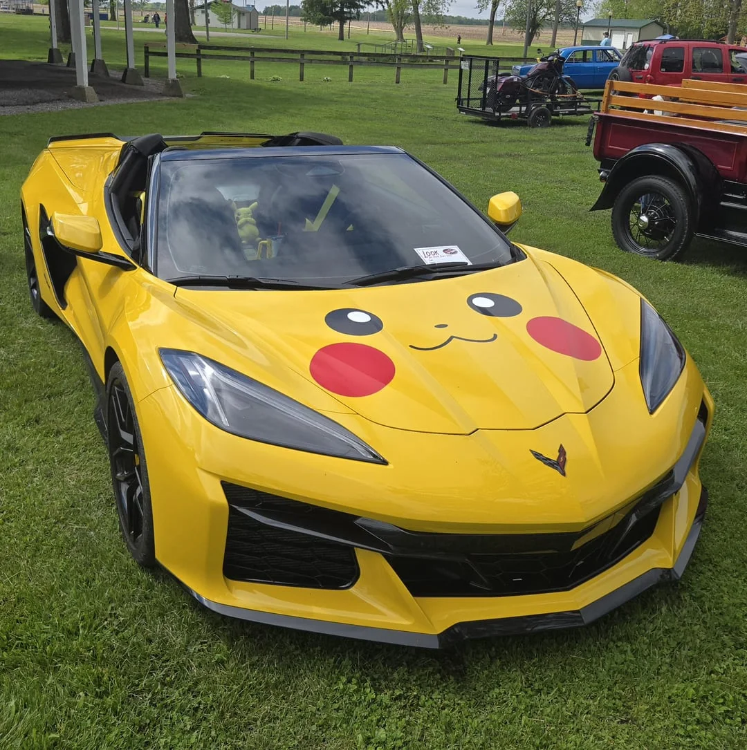 Itasha — Yellow Corvette convertible decorated with Pikachu face on the hood