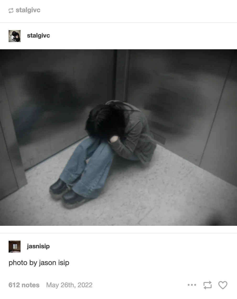 Jason Isip's Photography — Tumblr repost of a Jason Isip photo showing a person curled up in an elevator