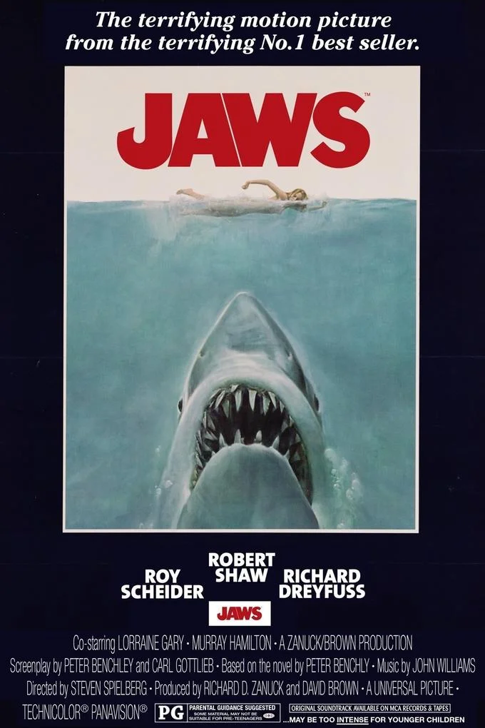 Jaws Poster Parodies — Original 1975 Jaws movie theatrical poster with shark rising toward swimmer