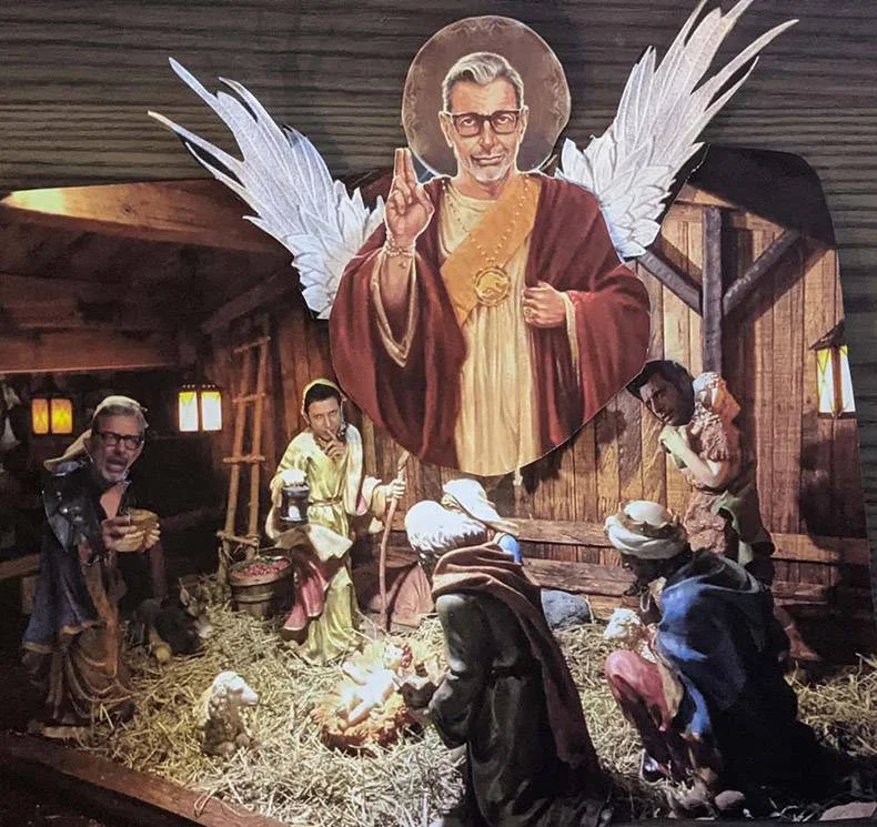 Nativity scene with Jeff Goldblum faces replacing Jesus, angels and shepherds