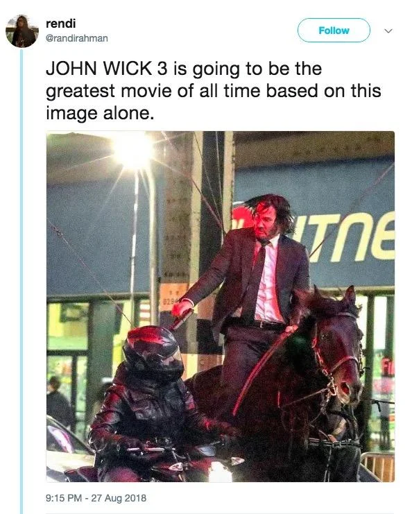John Wick On a Horse — Tweet by rendi @randirahman praising John Wick 3 with the set photo of Keanu Reeves riding a horse.