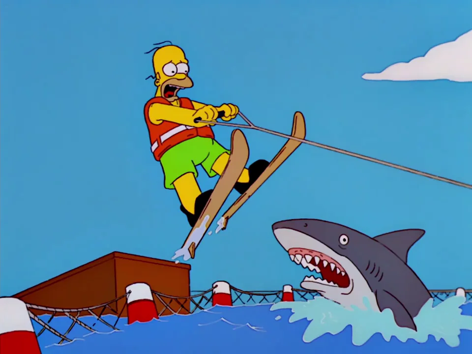 Jumping the Shark — Homer Simpson water skiing over a shark in a Simpsons parody