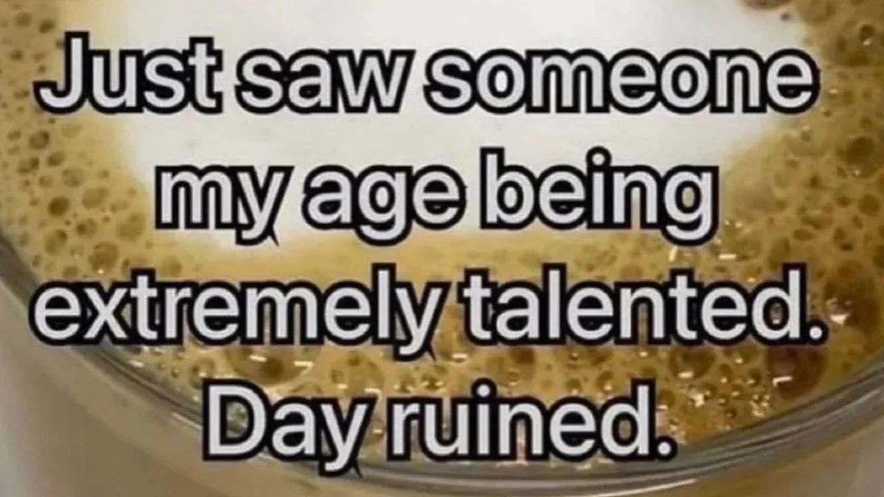 Just Saw Someone My Age Being Extremely Talented Day Ruined — Frothy coffee cup with white text reading 'Just saw someone my age being extremely talented. Day
