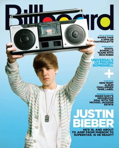 Justin Bieber on the cover of Billboard magazine holding a boombox
