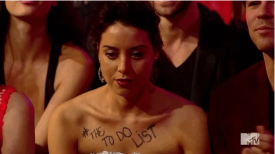 Kanye Interrupts Imma Let You Finish — Animated GIF from MTV event showing female performer on stage with text '#KanYeWest2012/TO DO LIST.'