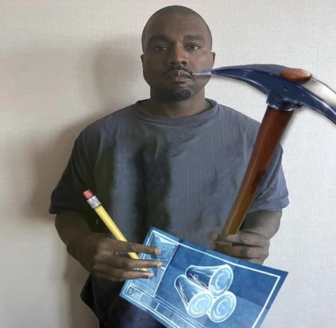 Kanye West Holding Notepad — Heavily photoshopped version with notepad replaced by glowing blue Fortnite schematic, pickaxe added.