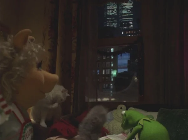 Kermit Did 9/11 — Miss Piggy and Kermit the Frog looking out a window at the New York skyline including the Twin Towers