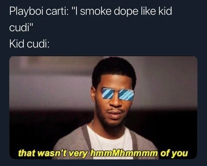 Kid Cudi Humming — Kid Cudi with sunglasses captioned 'that wasn't very hmmMhmmmm of you' responding to Playboi Carti.