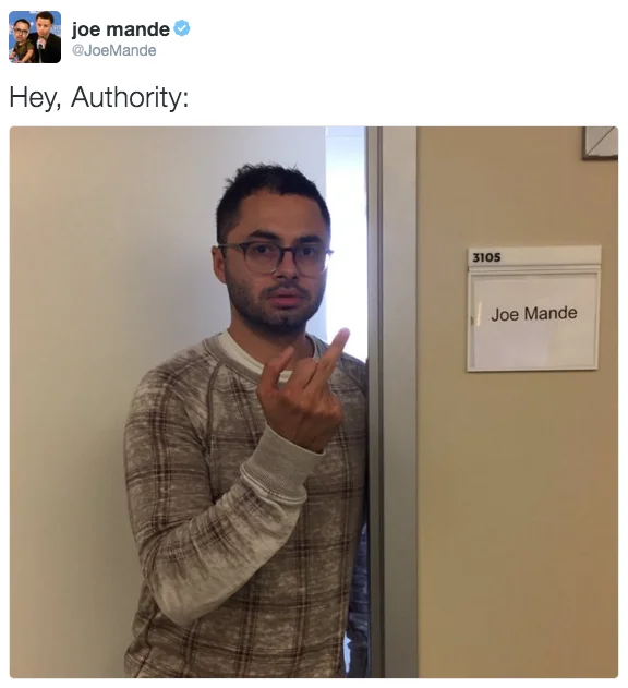 Kid Rock — Joe Mande parody tweet flipping off his own office name plate captioned Hey Authority