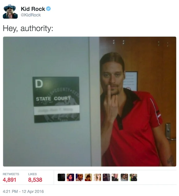 Kid Rock tweet 'Hey, authority:' showing him flipping off a state court sign