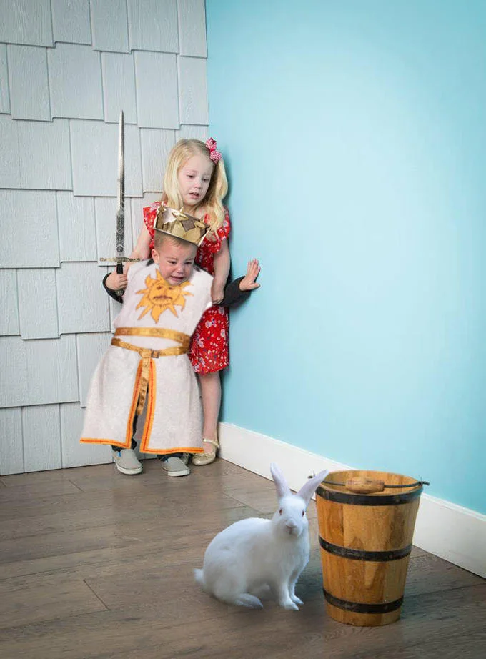 Kids Scared of Rabbit — Edited photo of the scared children costumed as King Arthur and a knight facing a white rabbit, parodying Monty Python and the Holy