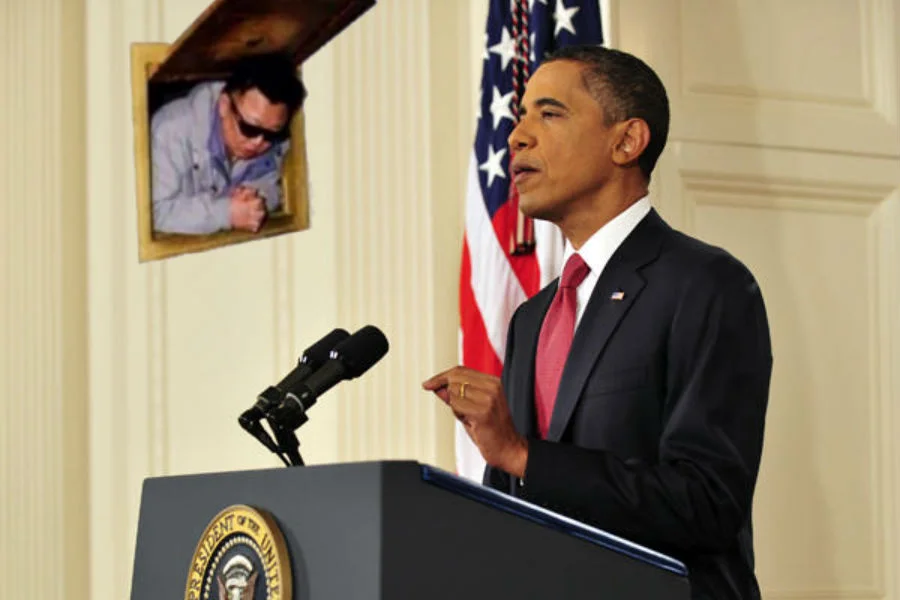 Kim Jong Il Looking At Things — Obama at White House podium with Kim Jong-il peeking from a wall hatch behind him