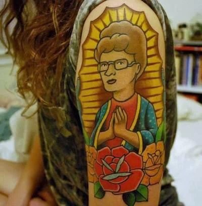 King of the Hill — Peggy Hill tattoo in Virgin of Guadalupe style on arm
