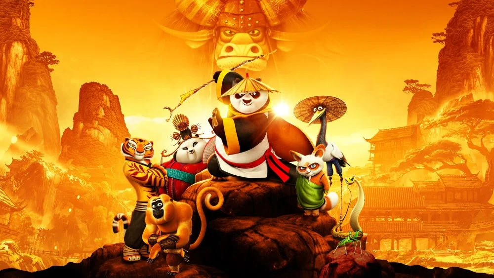 Kung Fu Panda — Po and the Furious Five posed together with mountains and a bull statue in the background.