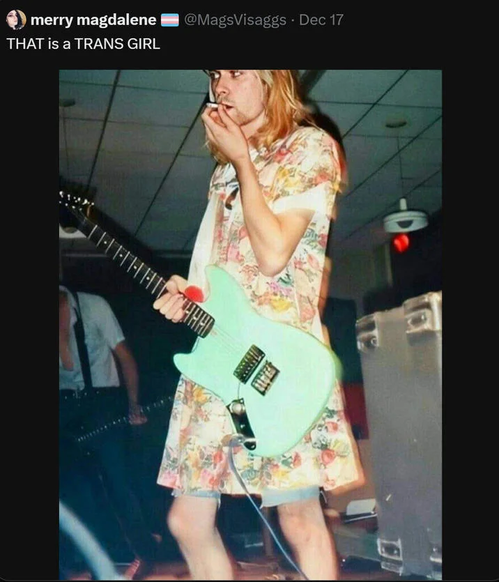 Kurt Cobain Was Trans Debate — Tweet with photo of Kurt Cobain in a floral dress captioned THAT is a TRANS GIRL