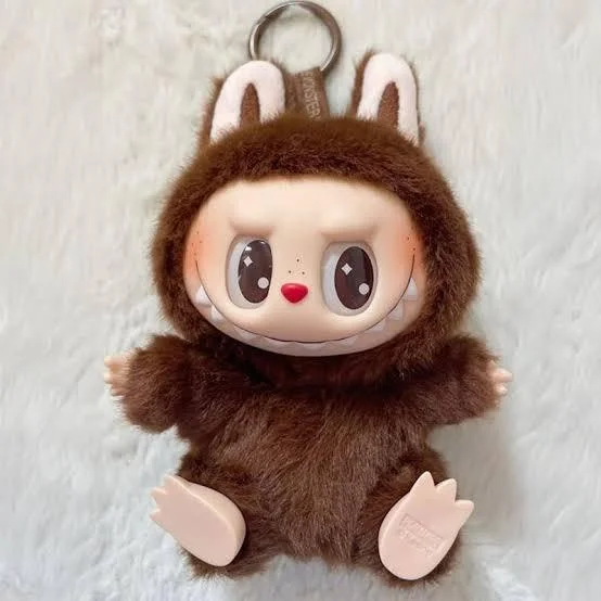 Labubu Toys — Brown Labubu plush keychain with bunny ears on white background