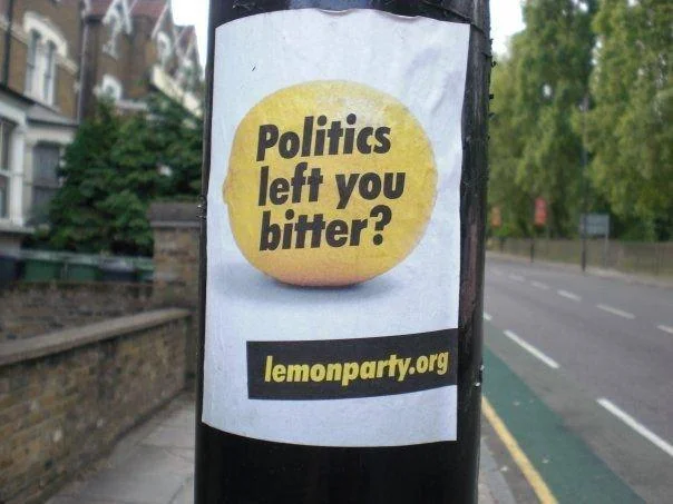 Lemon Party — Lemonparty.org street sticker on lamppost reading 'Politics left you bitter?'