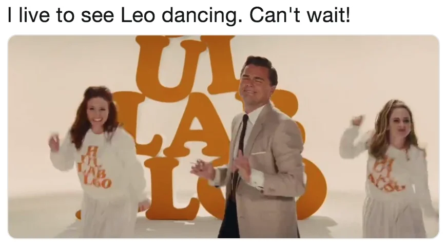 Leonardo DiCaprio Dancing — Tweet caption 'I live to see Leo dancing' above still of Leo DiCaprio dancing between two women on Hullabaloo set