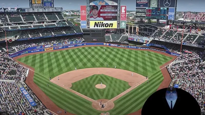 Lets Go Mets — A professional aerial view of Citi Field in Queens, New York showing the baseball diamond, stands filled with fans, and surrounding signage.