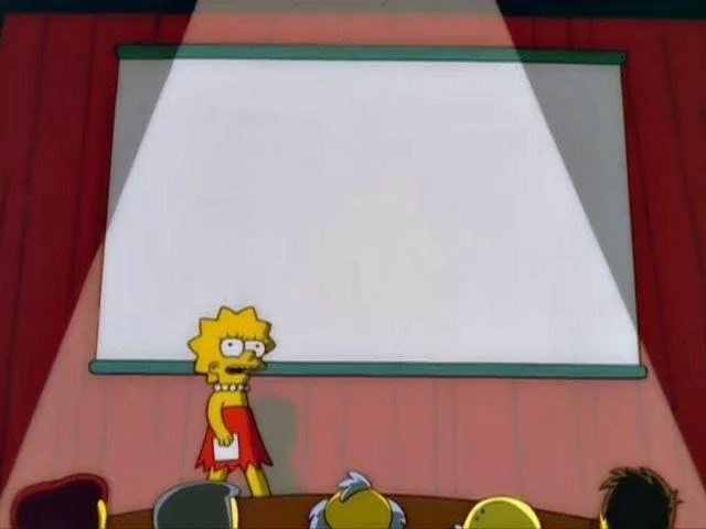 Lisa Simpson's Presentation — Animated GIF of Lisa Simpson presenting in front of a blank screen