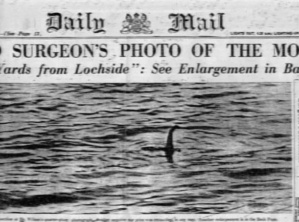 Loch Ness Monster — A Daily Mail newspaper front page bearing the headline 'SURGEON'S PHOTO OF THE MONSTER' with the famous long-necked creature silhouette