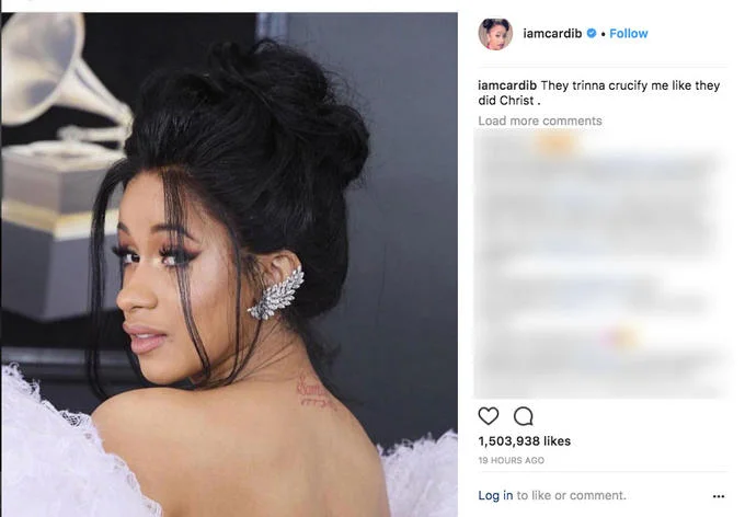 Logan Pauls Suicide Forest Video — A screenshot of an Instagram post from Cardi B posing elegantly in a white outfit at an awards ceremony, with caption 'They