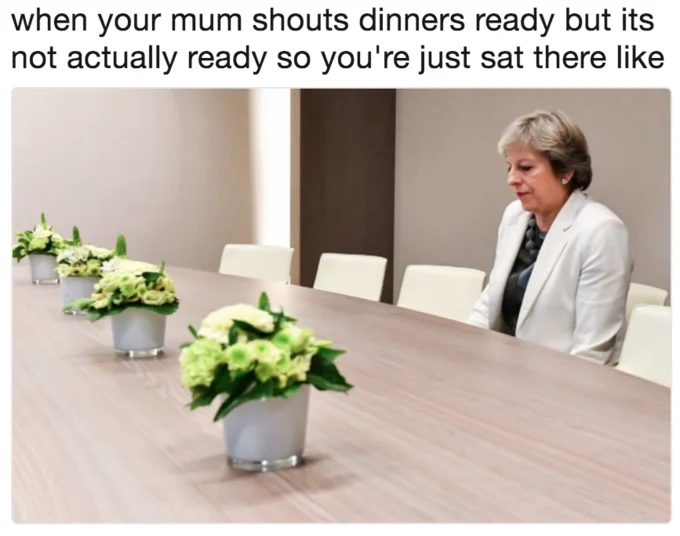 Lonely Theresa May — Theresa May sitting alone at empty table with caption about waiting for dinner to be ready.