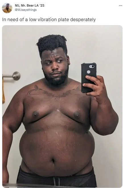 Tweet with a shirtless mirror selfie captioned 'In need of a low vibration plate desperately'.
