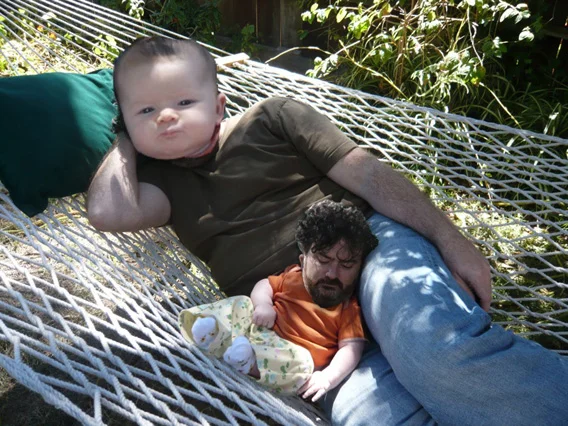 Manbabies — Religious painting of saint holding child with adult-like face