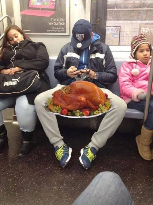 Manspreading — Photoshopped image of a subway manspreader with a turkey platter between his legs