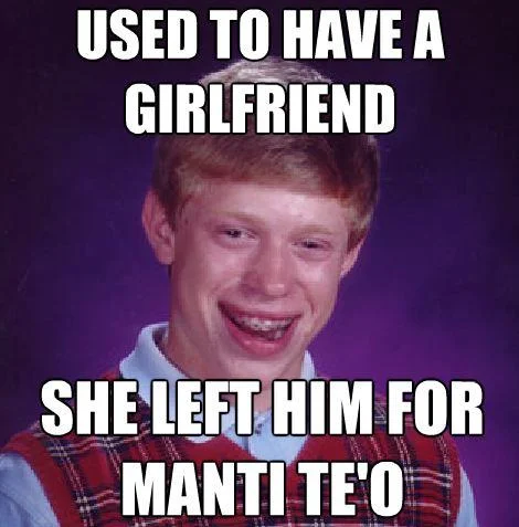 Manti Teos Girlfriend Hoax Teoing — Bad Luck Brian meme with red background and white impact text: 'USED TO HAVE A GIRLFRIEND' and 'SHE LEFT HIM FOR MANTI