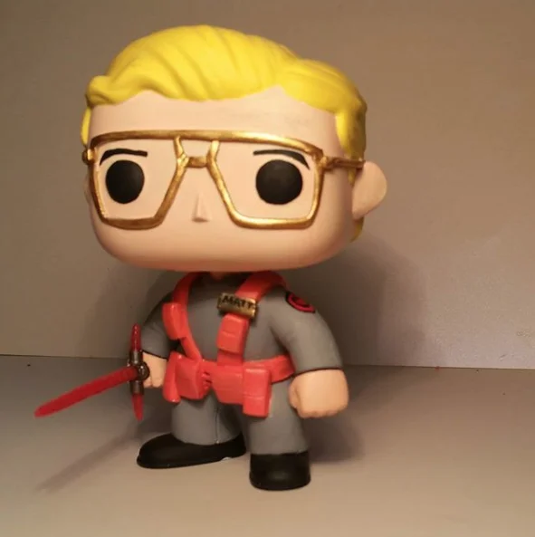 Custom Funko Pop figure of Matt the Radar Technician holding a broken red lightsaber