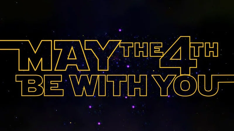 May The Force Be With You — May the 4th Be With You banner in Star Wars style yellow text on starry background