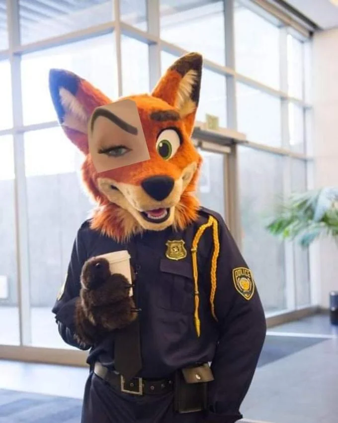Mc Mirella Sobrancelha — Fox fursuiter in police uniform with MC Mirella's eyebrow edited onto the mask.