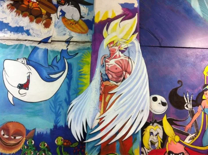 Mexico Loves Dragon Ball — Wall mural featuring Super Saiyan Goku alongside various animated movie characters.