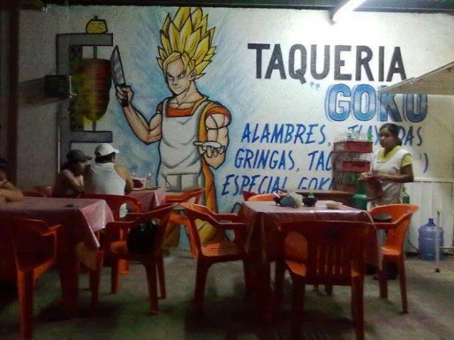 Mexico Loves Dragon Ball — Taqueria Goku restaurant interior with mural of Super Saiyan Goku holding a knife.