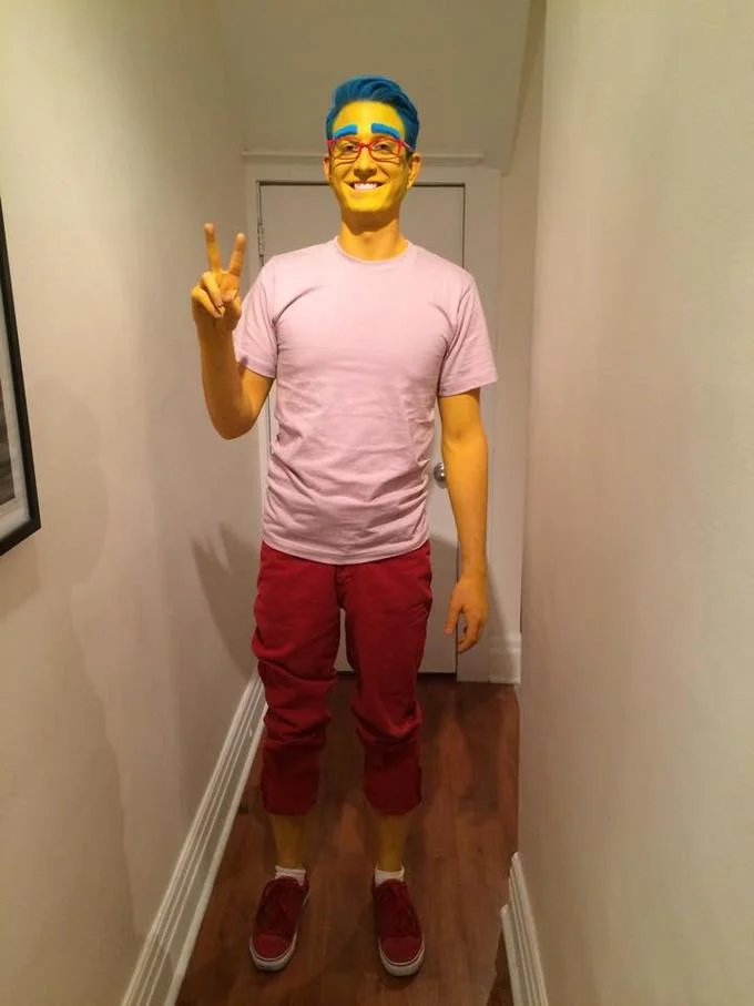 Milhouse Daryll Van Houten — Person cosplaying as Milhouse Van Houten in yellow face paint