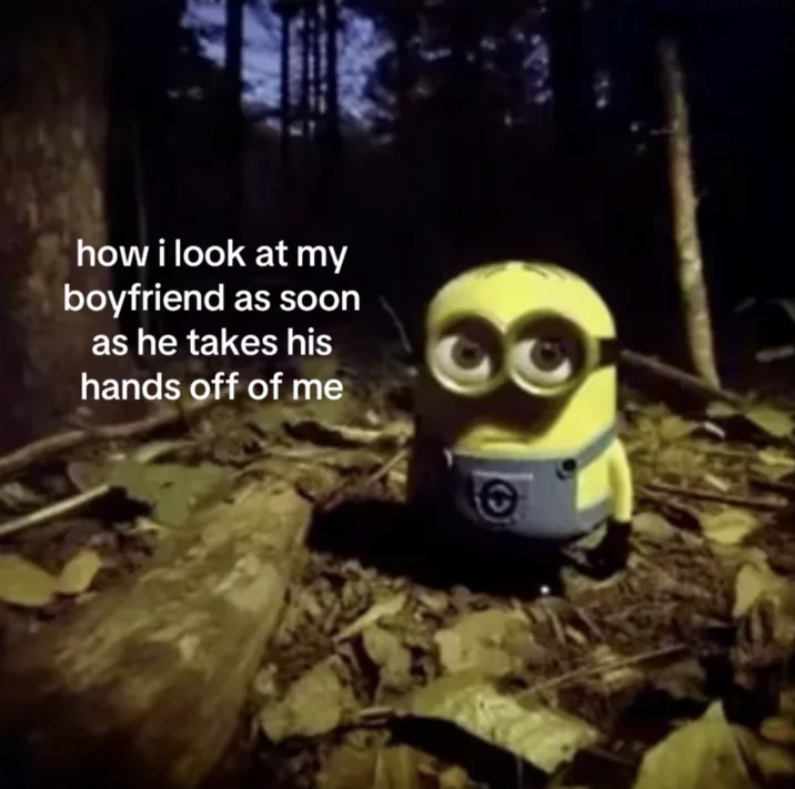 Minion Staring In The Forest — Minion in forest with caption about staring at boyfriend when he takes his hands off