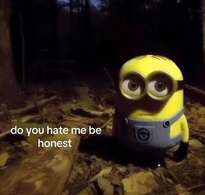 Minion Staring In The Forest — Minion in forest with caption 'do you hate me be honest'