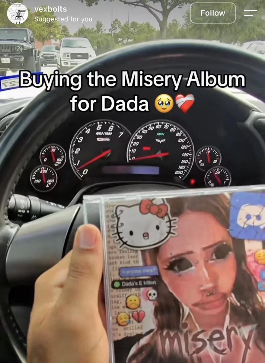TikTok screenshot of a hand holding a 'Misery' CD featuring the misery girl illustration inside a car