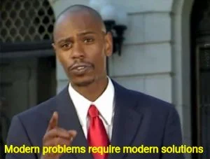 Modern Problems Require Modern Solutions — Canonical version of meme featuring Dave Chappelle in characteristic pointing pose with iconic yellow text.