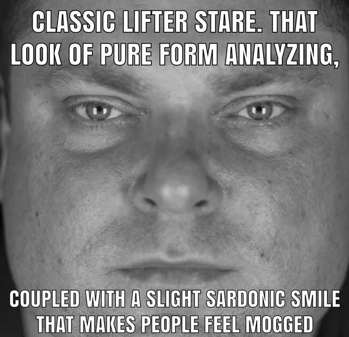 Stoic muscular man's face with text about lifter stare and mogging