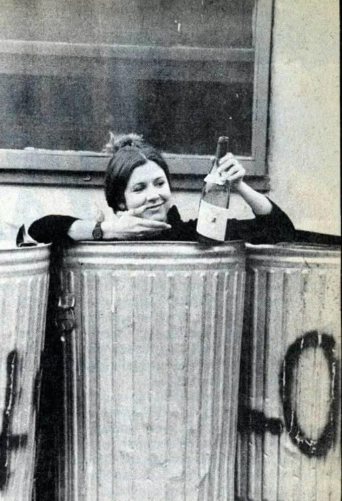 Mood — Vintage black and white photograph of woman making peace sign at window