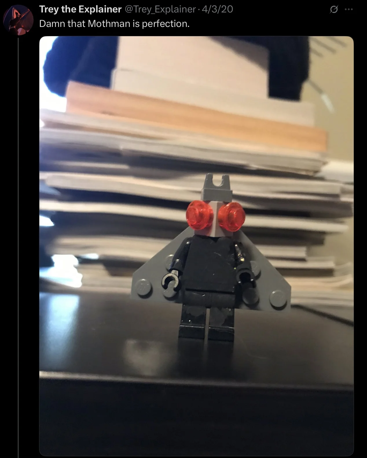 Mothman/Owlman — Close-up photo of a Lego Mothman minifigure with red eyes and gray wings
