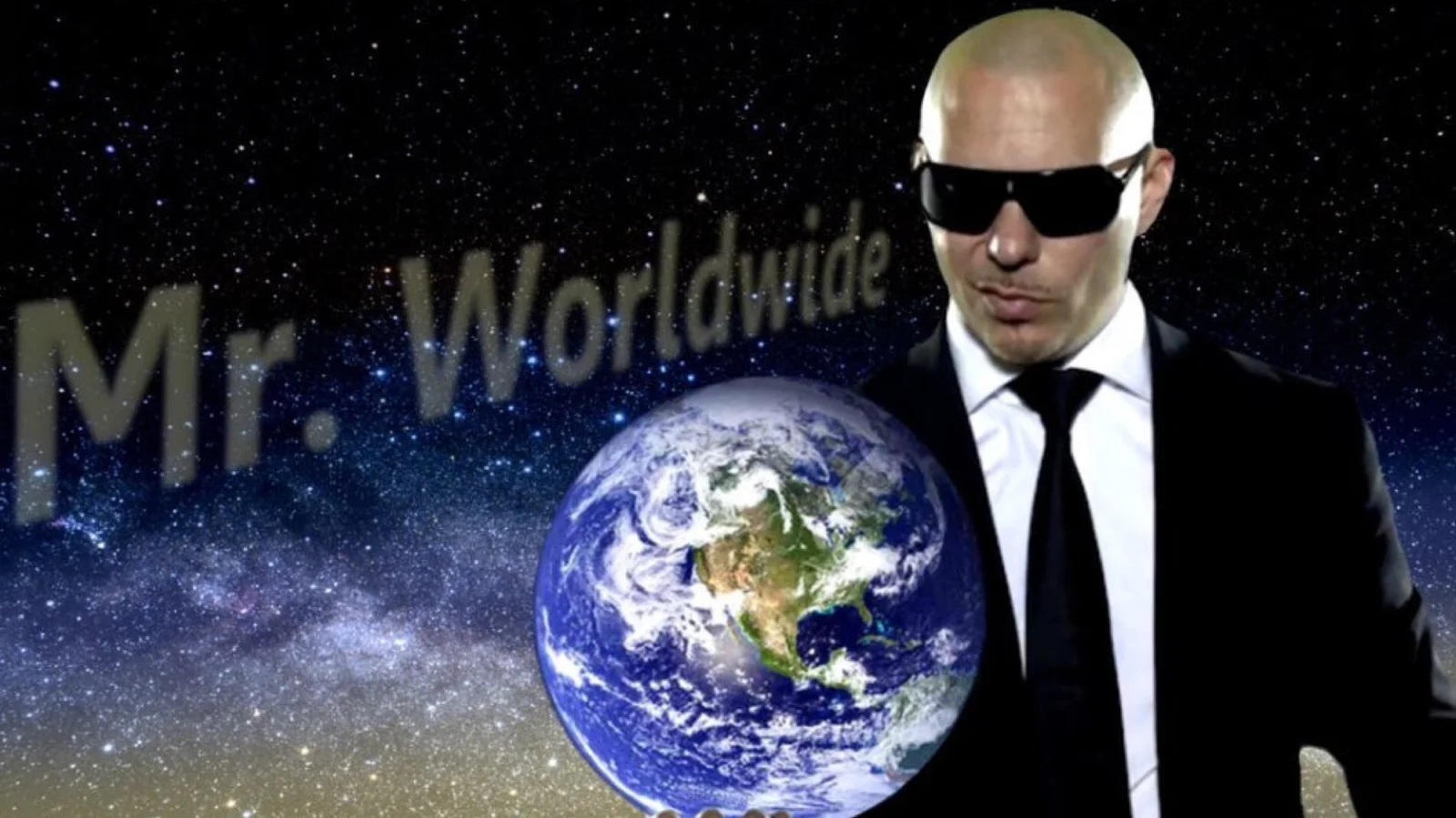 Definitive Mr. Worldwide image of Pitbull in black suit holding glowing blue Earth against starfield.