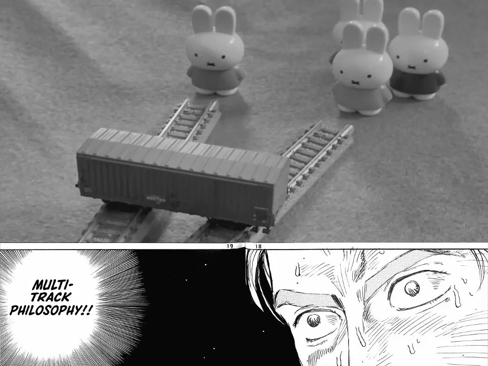 MULTI-TRACK DRIFTING — Miffy toy train drifting across two tracks with 'Multi-Track Philosophy' Densha de D caption