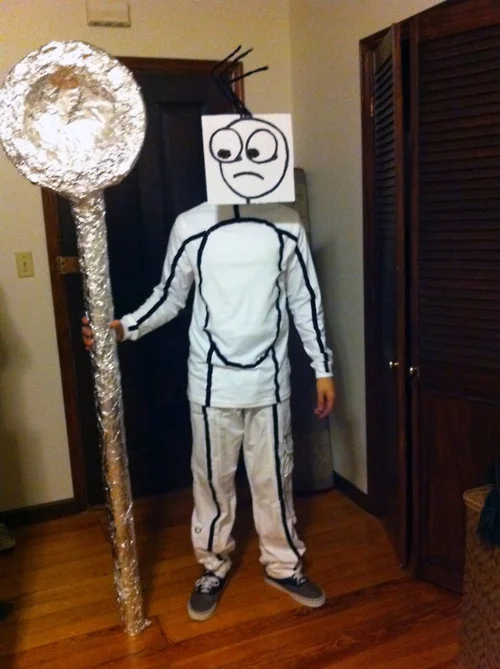 My Spoon Is Too Big — Person in DIY stick figure costume holding oversized foil spoon