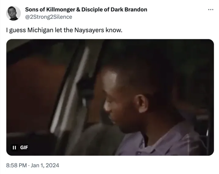 Tweet with GIF of a man in a car, captioned 'I guess Michigan let the Naysayers know.'