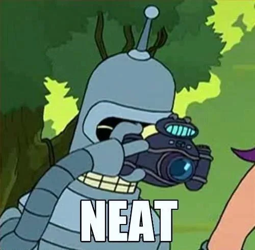 Bender from Futurama with a camera and the word NEAT