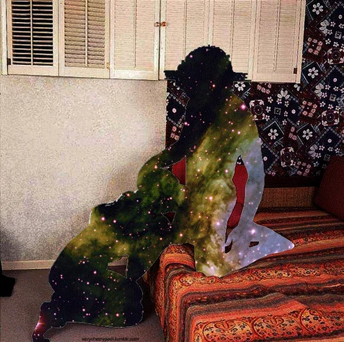 Nebula GIFs — Person on couch with body silhouette replaced by animated nebula stars